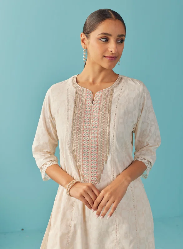 Ivory Textured Kurta set with Multicolor Embroidery